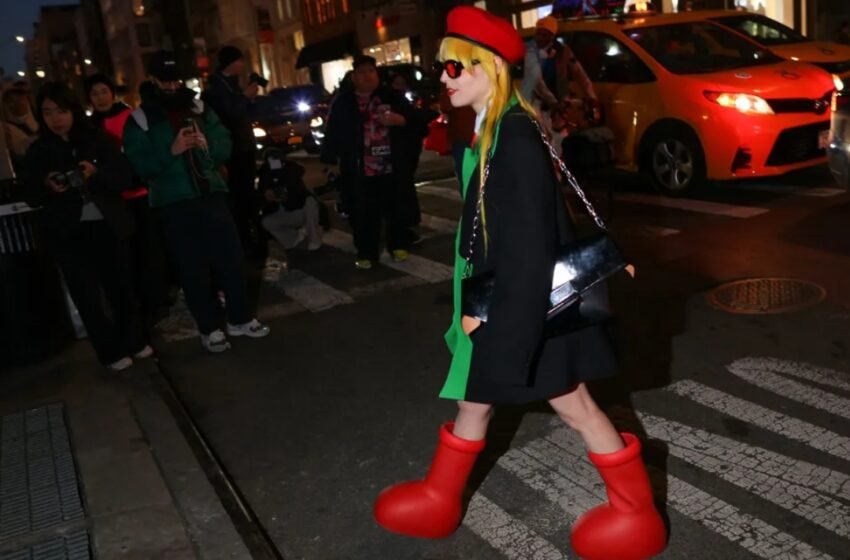  Why Is Everyone Wearing These Cartoonish Red Boots ?